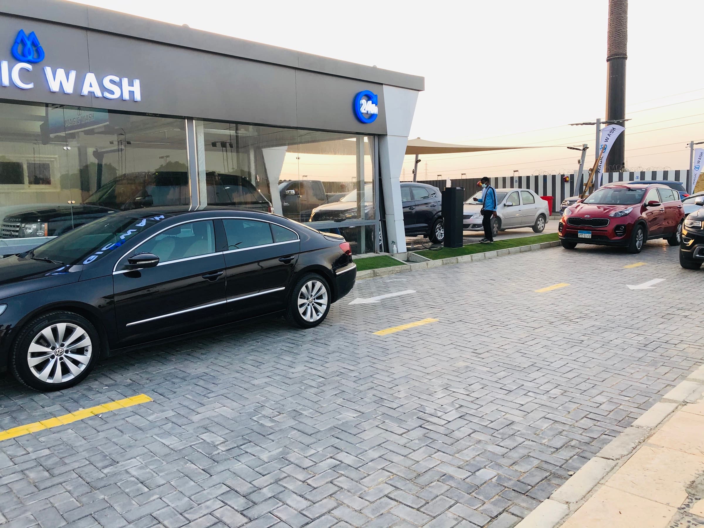 Magic Wash branch front with 24h neon sign